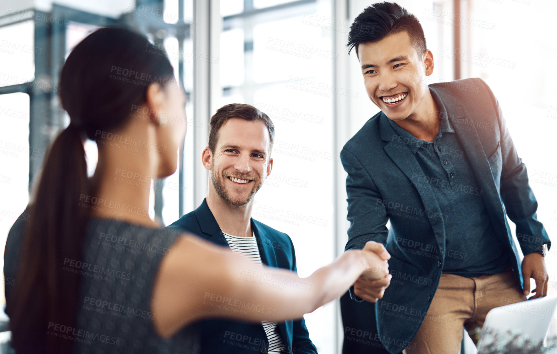 Buy stock photo Man, woman and handshake in office at business meeting with smile for welcome, introduction and respect at job. People, shaking hands and happy with diversity, collaboration and onboarding at agency