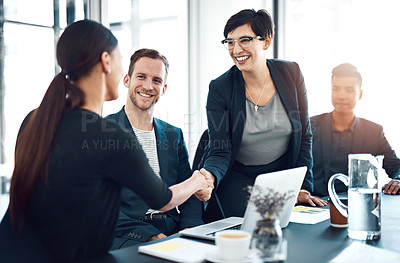Buy stock photo Shot of businesspeople having a meeting in a boardroom