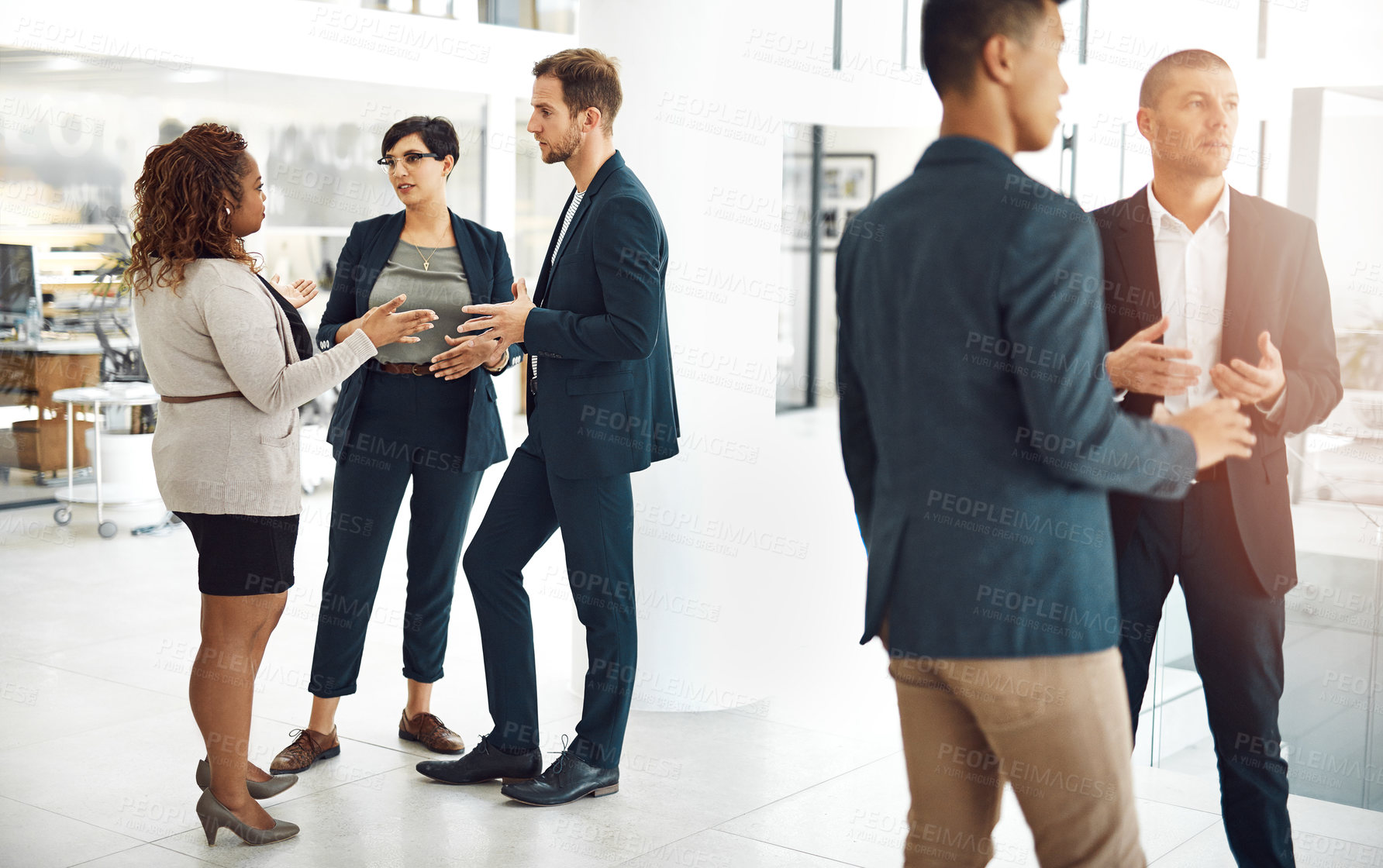 Buy stock photo Meeting, office and business people in discussion, talking and conversation in modern building in morning. Corporate, professional and men and women for teamwork, collaboration and partnership