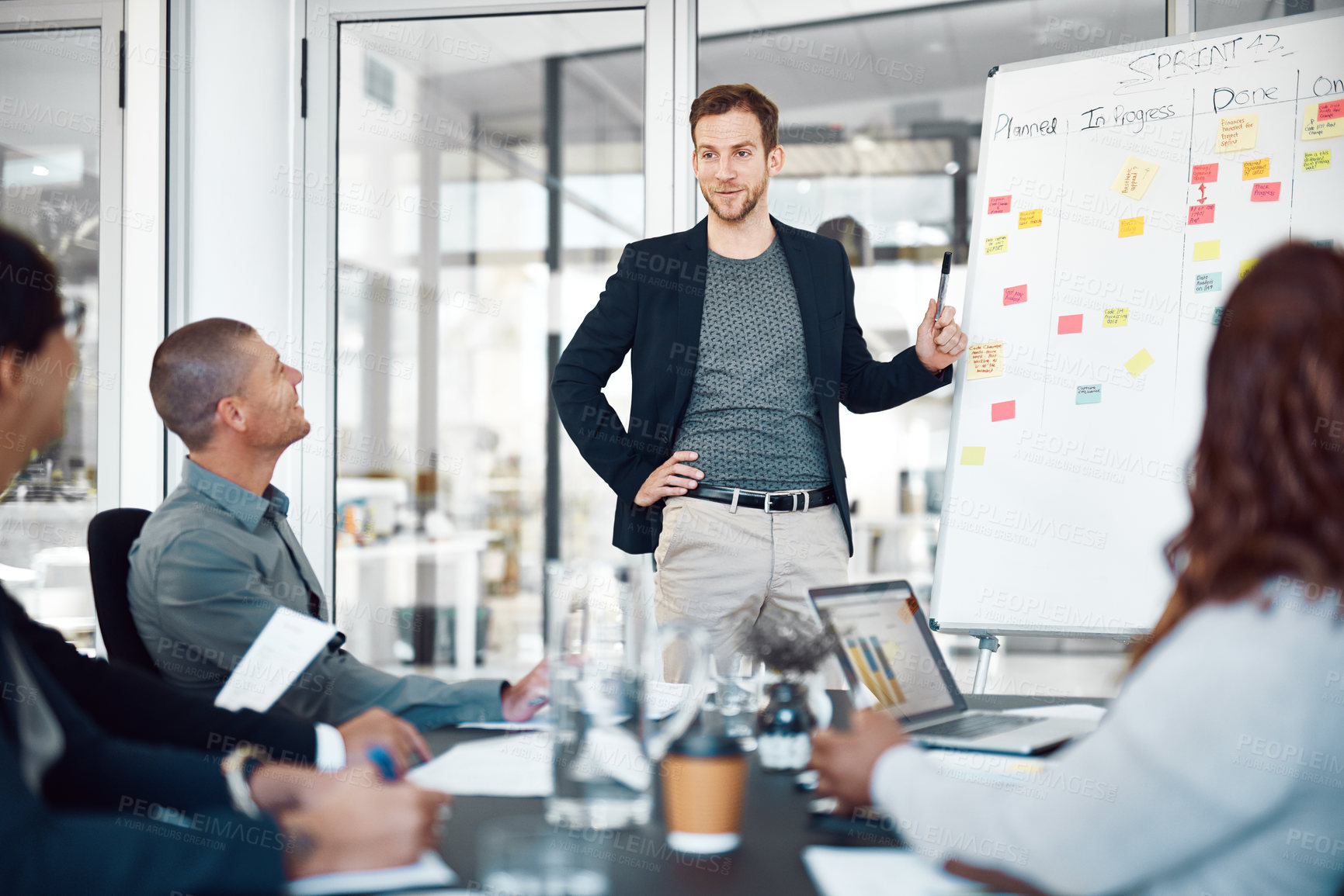 Buy stock photo Shot of businesspeople having a meeting in a boardroom