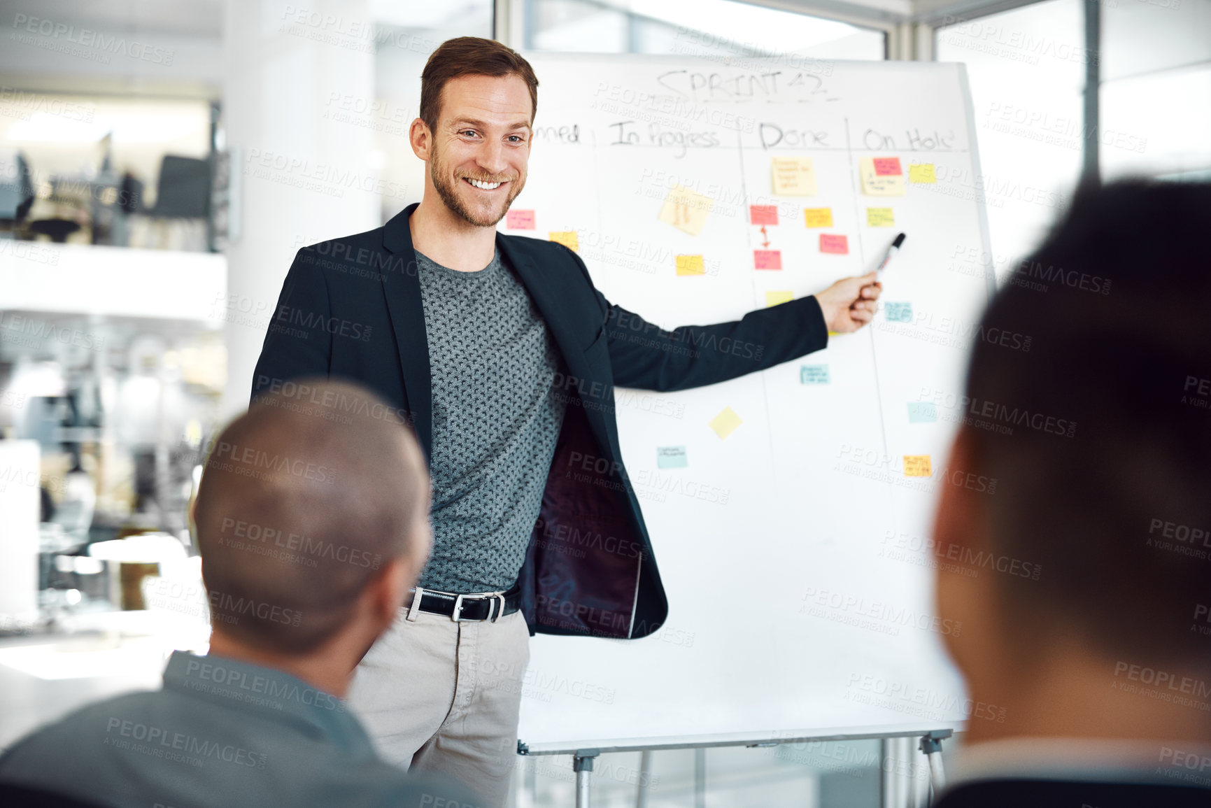 Buy stock photo Man, presentation and sticky notes on whiteboard for schedule, timeline and brainstorming strategy in office. Speaker, meeting and group training in boardroom for goals, collaboration and instruction