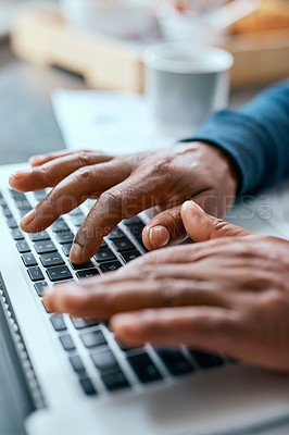 Buy stock photo Shot of an unrecognizable man using a laptop at home