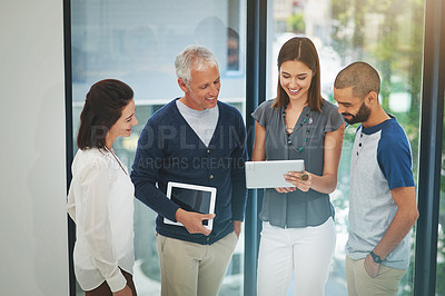 Buy stock photo Happy business people, tablet and discussion with team for research, planning or brainstorming at office. Group of employees in collaboration with technology for creative project, design or startup