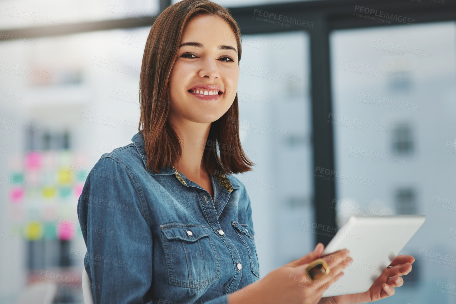 Buy stock photo Happy woman, portrait and creative with tablet for data, development or research on agenda at office. Young female person, designer or employee browsing on technology for online startup at workplace