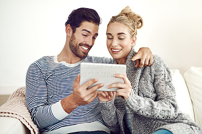 Buy stock photo Happy couple, choice or tablet for movie, news and streaming online on couch in living room. Technology, internet or people in lounge on social network app on digital website or touchscreen in home