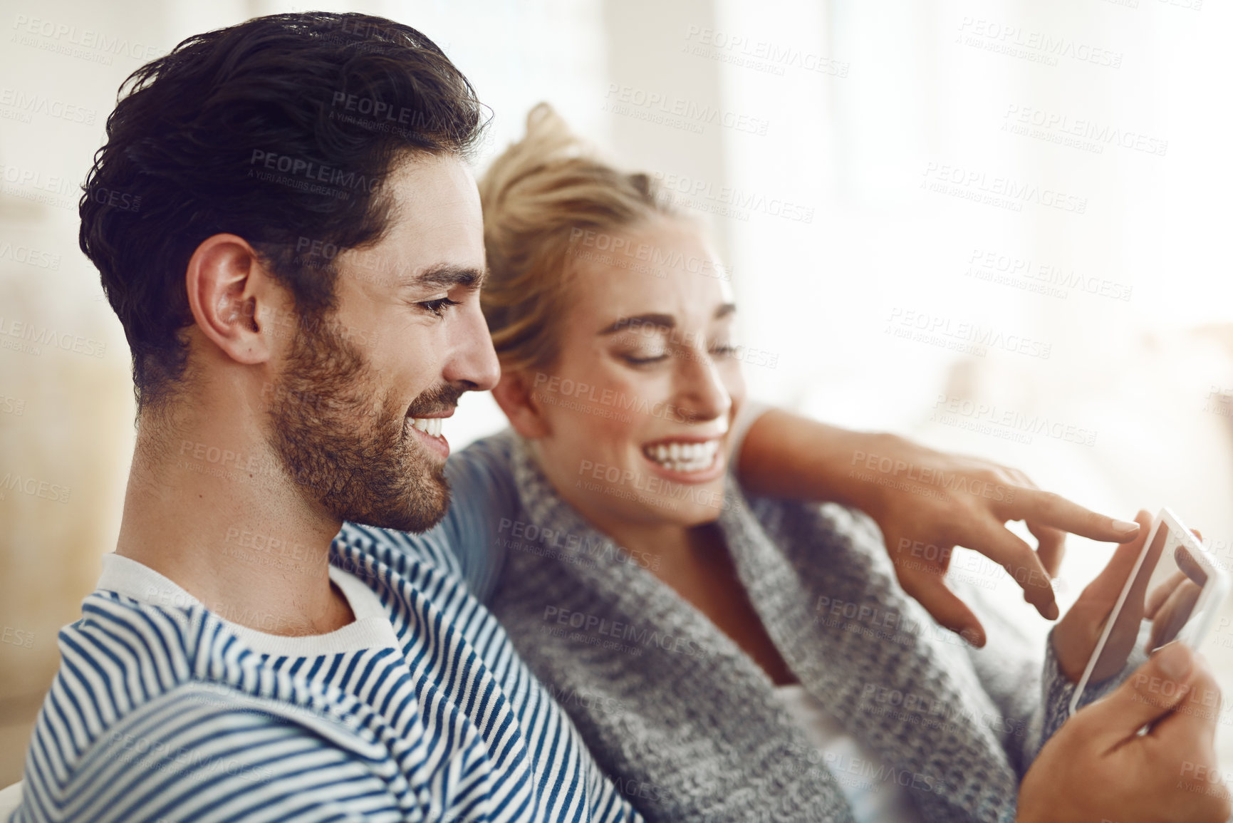 Buy stock photo Happy couple, laughing or tablet for movie, streaming online or news on couch in living room. Technology, internet subscription and people in lounge on digital website and touchscreen app in home