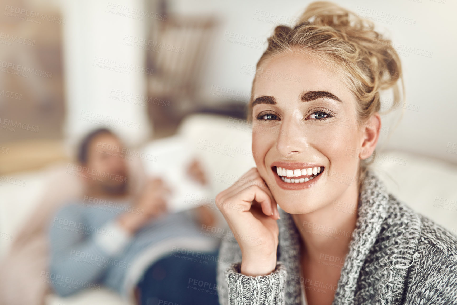 Buy stock photo Portrait, woman and smile in home for relax, comfort and weekend with husband. Housewife, man and happy on sofa for peace, wellness and together in apartment with good mood or bonding in marriage