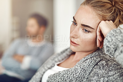 Buy stock photo Upset, depression and woman in argument with her boyfriend in the living room of their apartment. Sad, disappointed and moody female person with conflict, fight or breakup with partner at their home.
