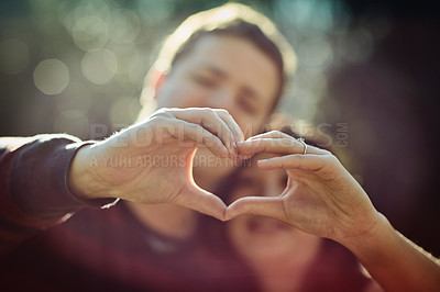 Buy stock photo Cropped shot of an affectionate couple outdoors