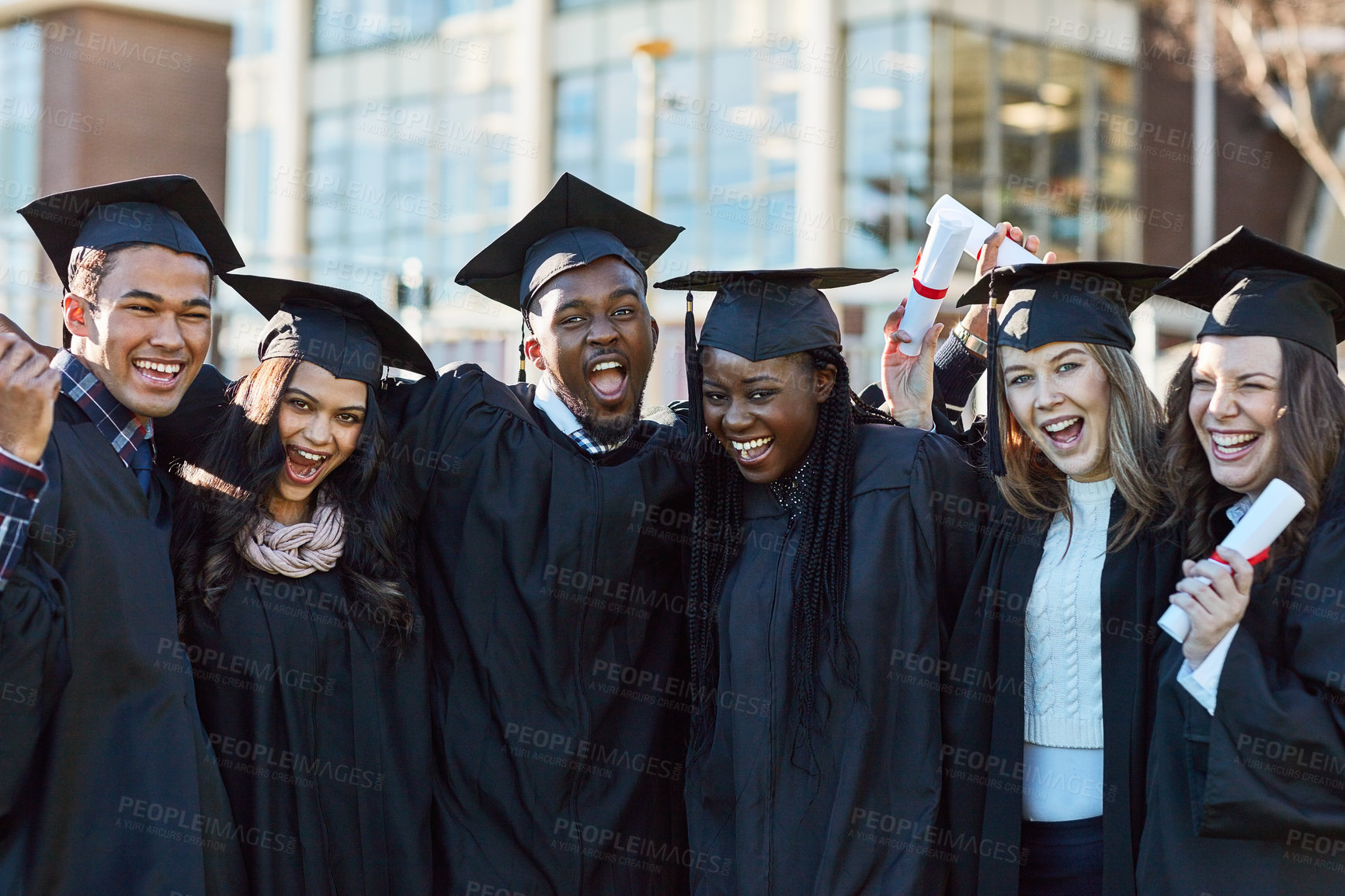 Buy stock photo Excited, university and portrait of friends for graduation, ceremony and academic success. College, diversity and happy men and women on campus with achievement for education, learning and studying