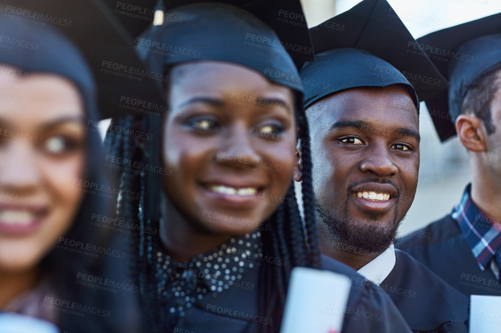 Buy stock photo Man, graduation and diploma with portrait, line and happy for achievement, goals and celebration at college. People, friends or students with certificate, smile or excited at university in Nigeria