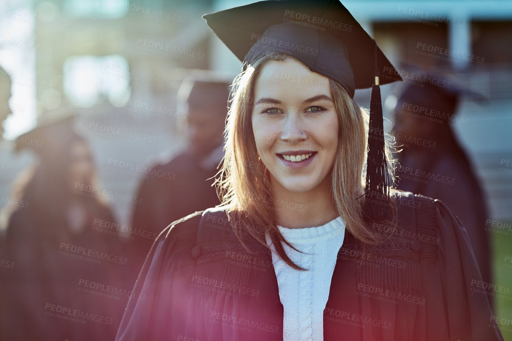 Buy stock photo Smile, university and portrait of woman at graduation with confidence, achievement and education. School, opportunity and happy college student on campus with scholarship at award ceremony in USA