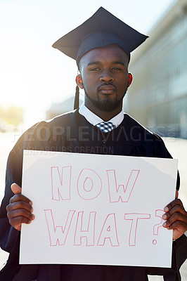 Buy stock photo Portrait of a student holding a sign that reads 