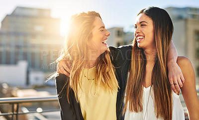 Buy stock photo Shot of young female friends spending the day outside