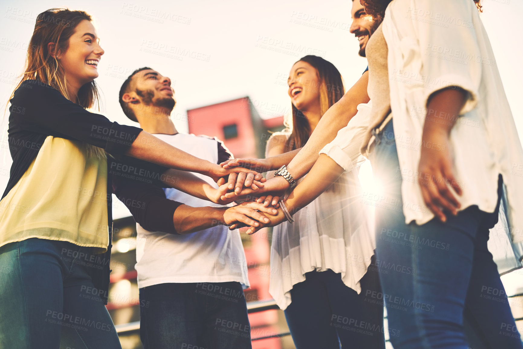 Buy stock photo Group, happy friends and stack of hands for solidarity, celebration and success for vacation outdoor. People, men and women with huddle together for support, motivation and travel in city of Brazil