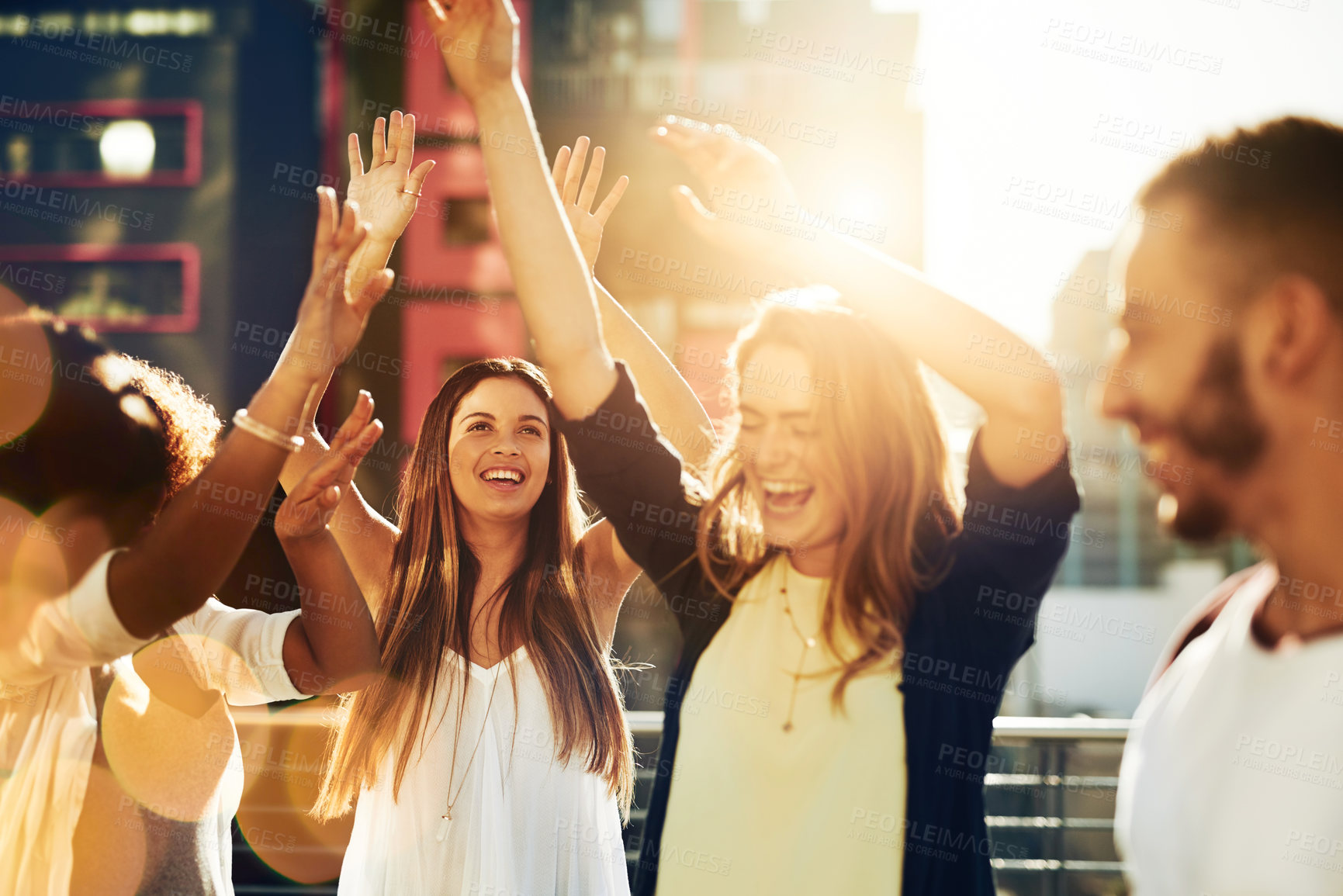 Buy stock photo Shot of young friends spending the day outside