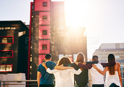 Buy stock photo Rearview shot of friends spending the day outside