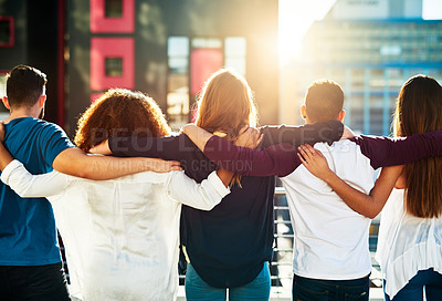 Buy stock photo Rearview shot of friends spending the day outside
