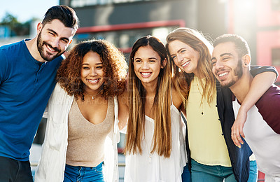 Buy stock photo Shot of young friends spending the day outside