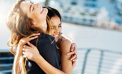 Buy stock photo Shot of  young female friends spending the day outside