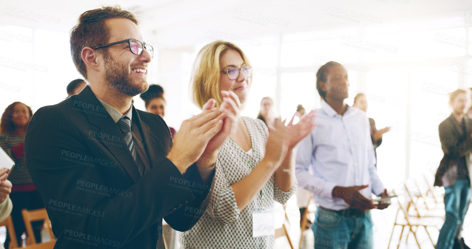 Buy stock photo Cropped shot of a group of corporate businesspeople applauding during an award ceremony