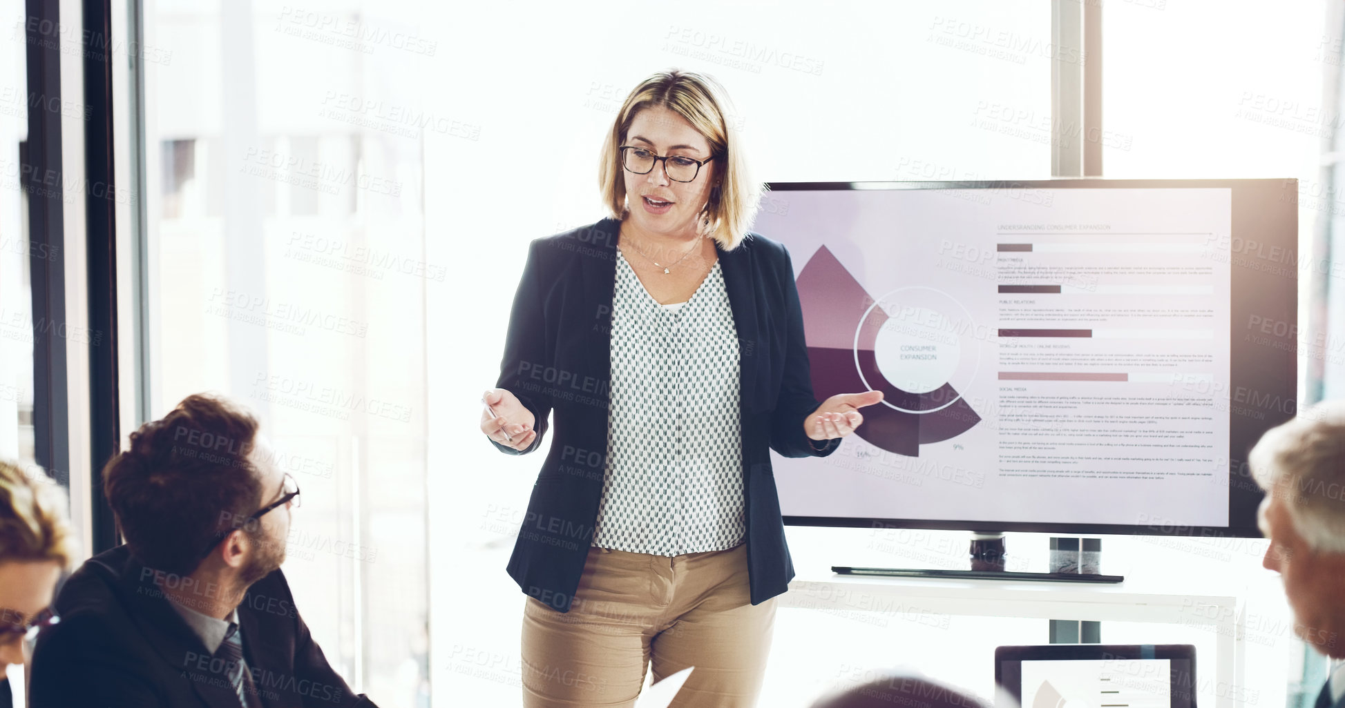 Buy stock photo Cropped shot of an attractive young businesswoman giving a presentation in the boardroom