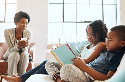 Buy stock photo African mother, book and children with reading on sofa with smile, care and learning for language in home. Black family, people and storytelling for connection, bonding and relax in pajamas on couch