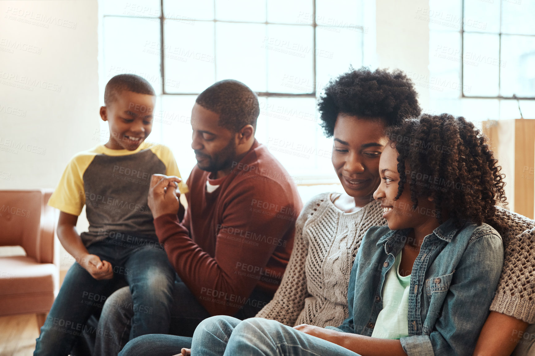 Buy stock photo Shot of a family having fun indoors 