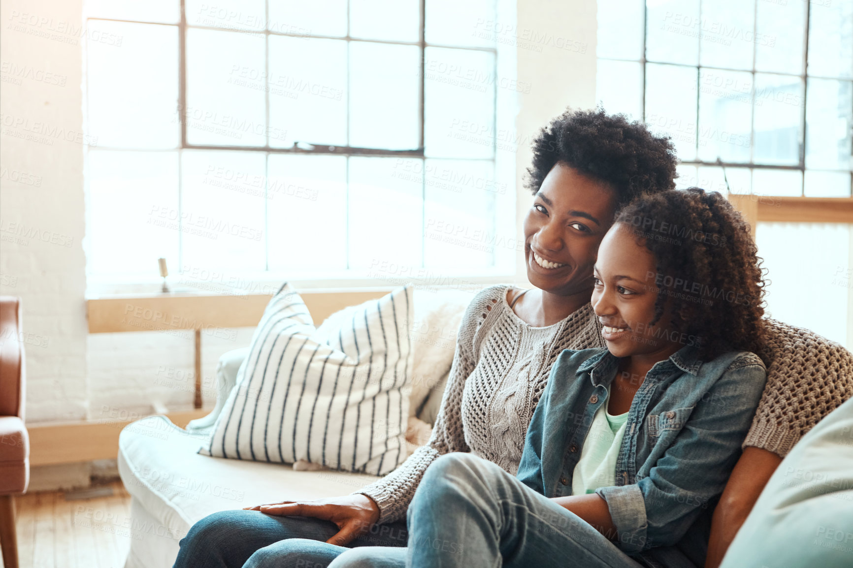 Buy stock photo Love, mother and teen girl on sofa for happy family time together in apartment in South Africa on weekend. Smile trust and support, black woman and teenager sitting on couch with healthy relationship