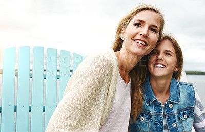 Buy stock photo Shot of a mother and her daughter bonding outdoors