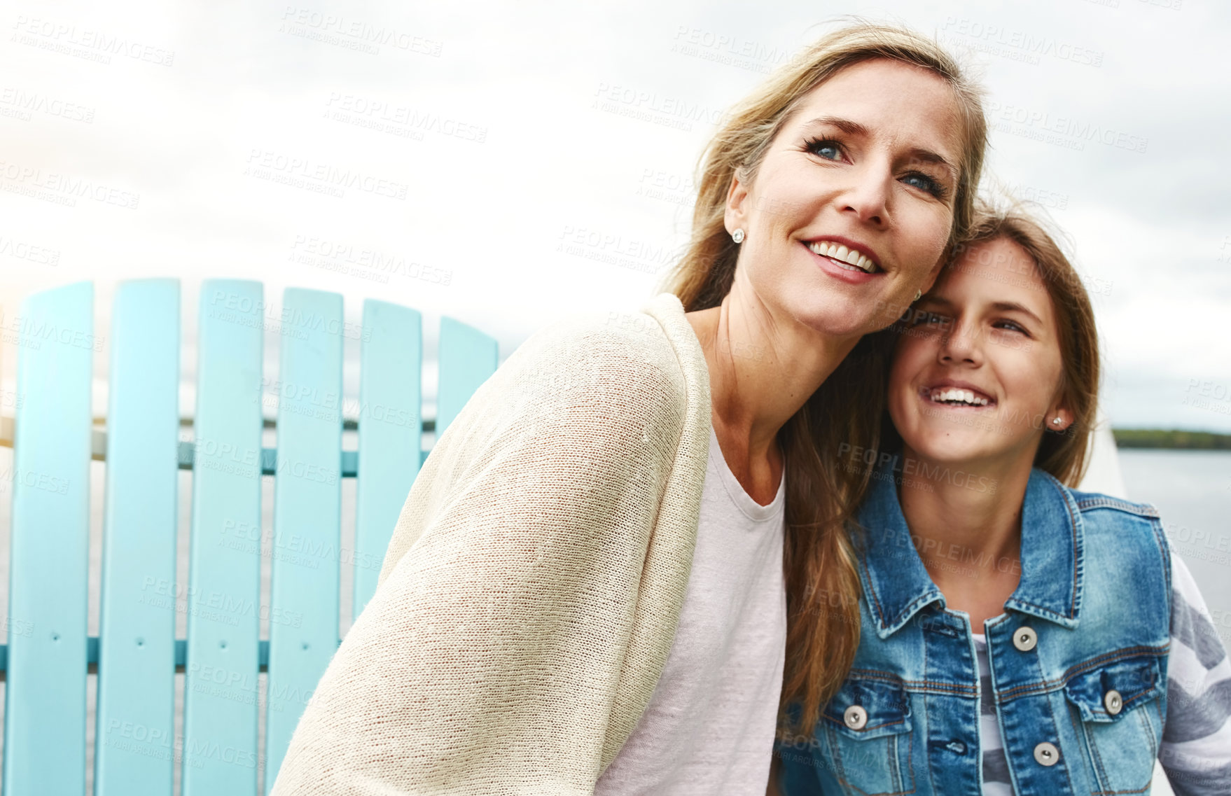 Buy stock photo Shot of a mother and her daughter bonding outdoors