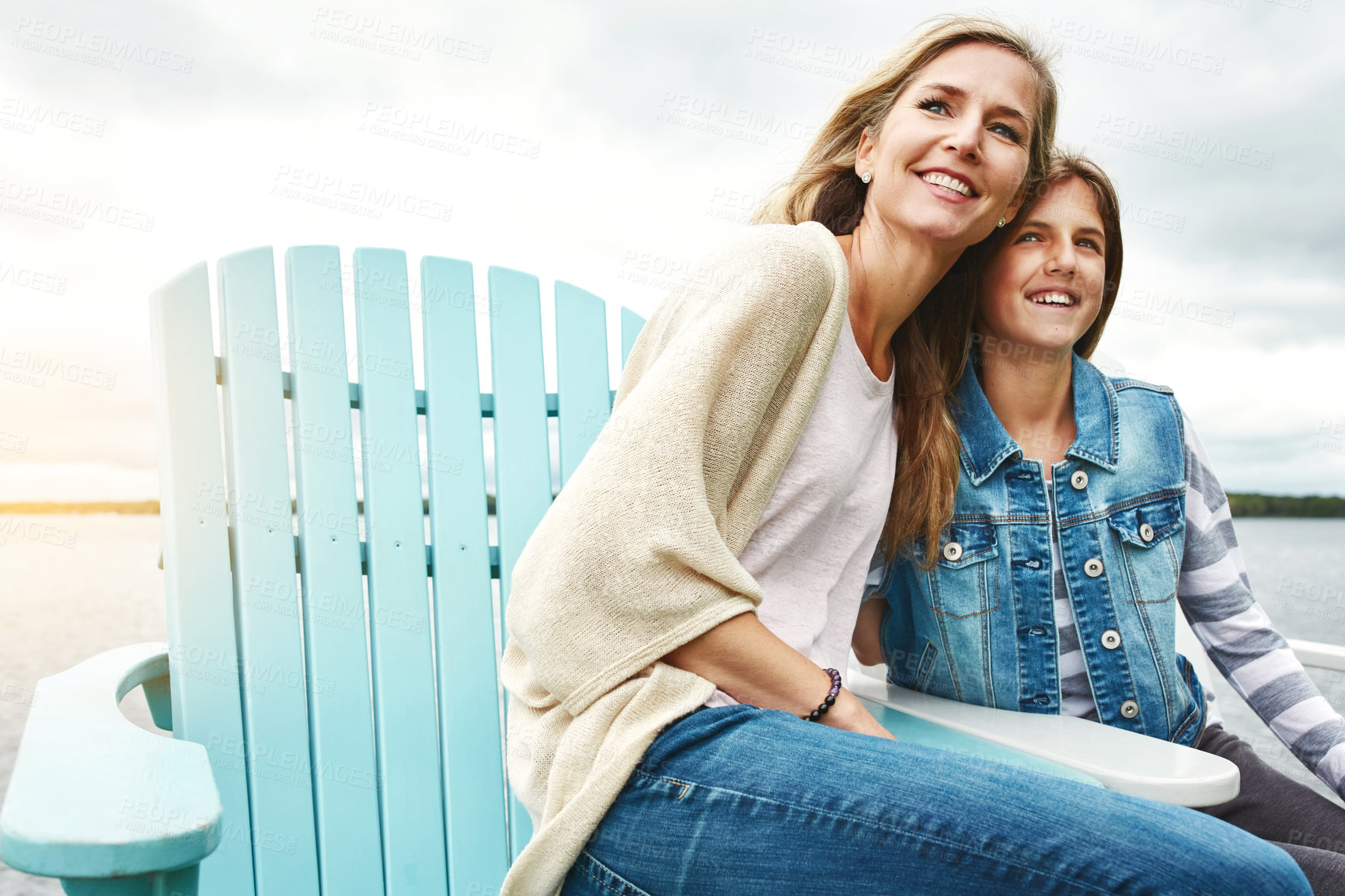 Buy stock photo Shot of a mother and her daughter bonding outdoors