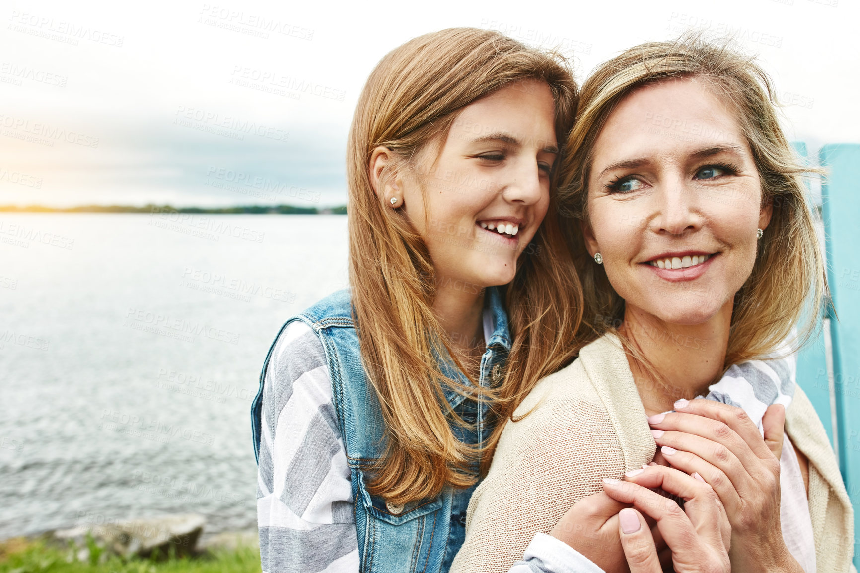 Buy stock photo Shot of a mother and her daughter bonding outdoors