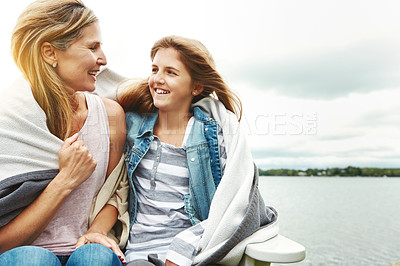 Buy stock photo Shot of a mother and her daughter bonding outdoors