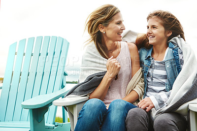 Buy stock photo Shot of a mother and her daughter bonding outdoors