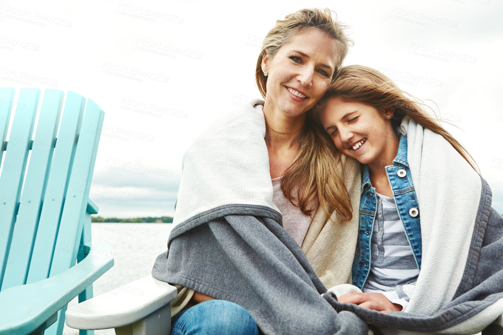 Buy stock photo Portrait of a mother and her daughter bonding outdoors