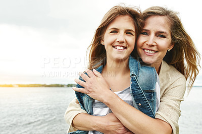 Buy stock photo Portrait of a mother and her daughter bonding outdoors