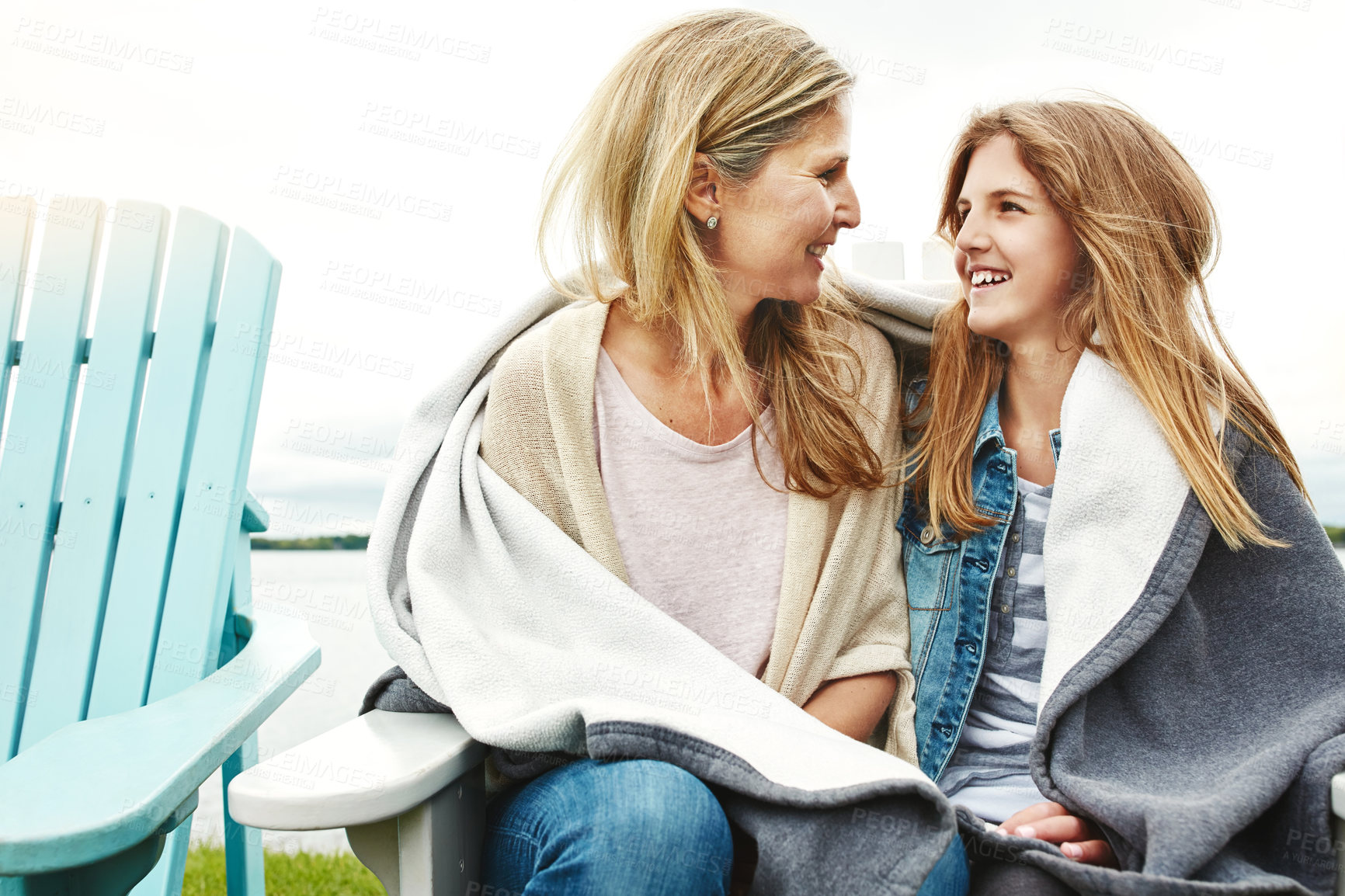 Buy stock photo Shot of a mother and her daughter bonding outdoors