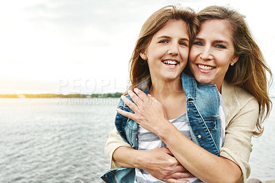 Buy stock photo Portrait of a mother and her daughter bonding outdoors