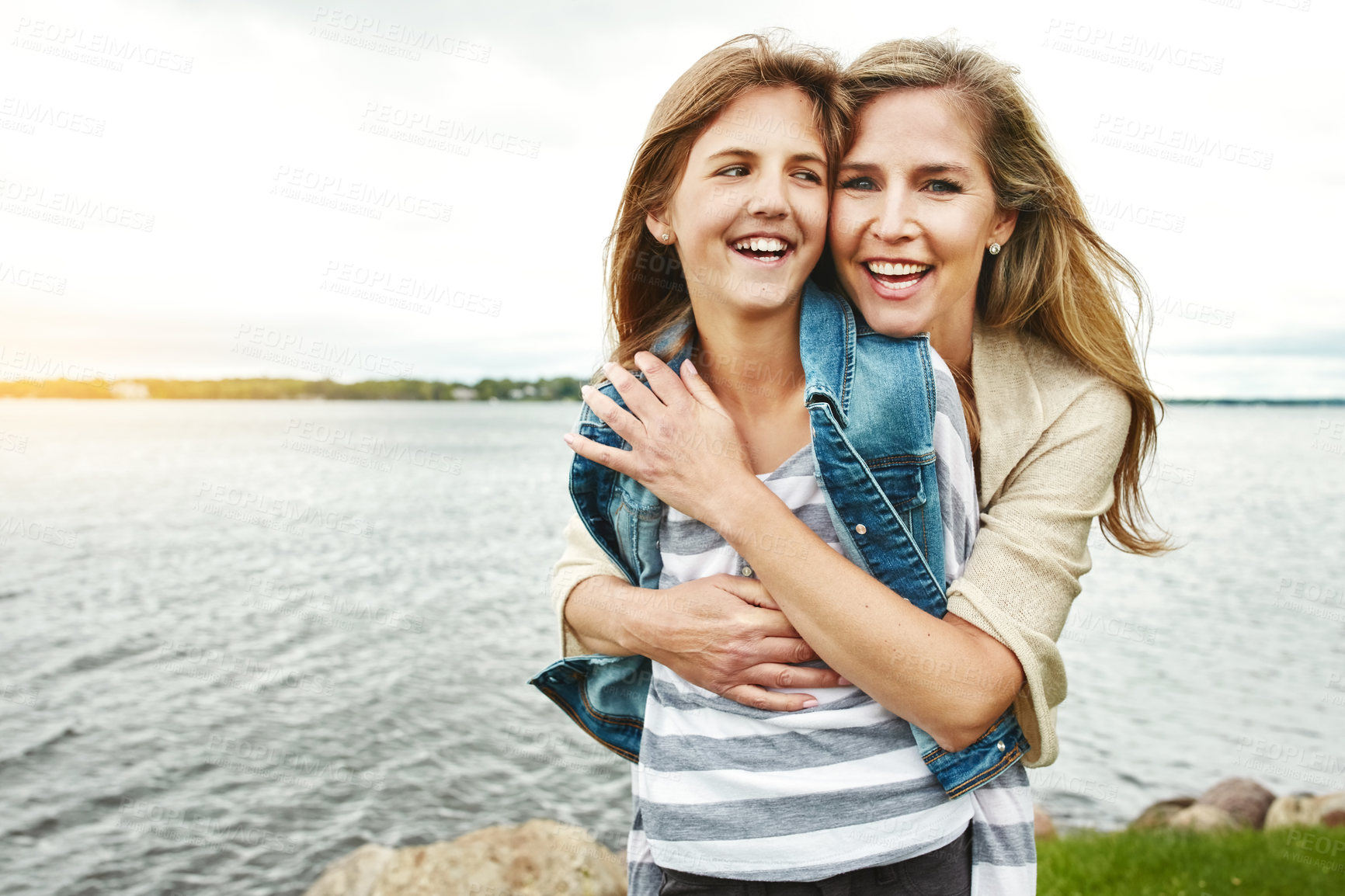 Buy stock photo Portrait of a mother and her daughter bonding outdoors