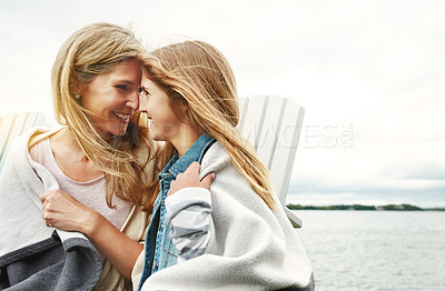 Buy stock photo Shot of a mother and her daughter bonding outdoors