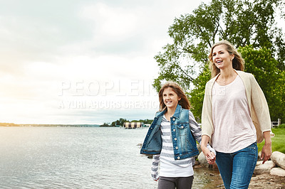 Buy stock photo Holding hands, lake or summer with mother and daughter outdoor in nature together for bonding. Family, love or walking with woman and girl child at park by river for security, support or trust