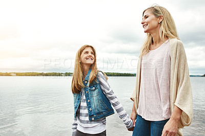 Buy stock photo Shot of a mother and her daughter bonding outdoors