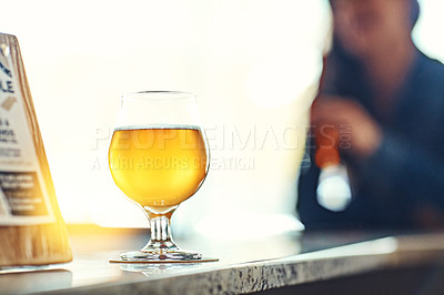 Buy stock photo Shot of drinks on a counter at a bar 