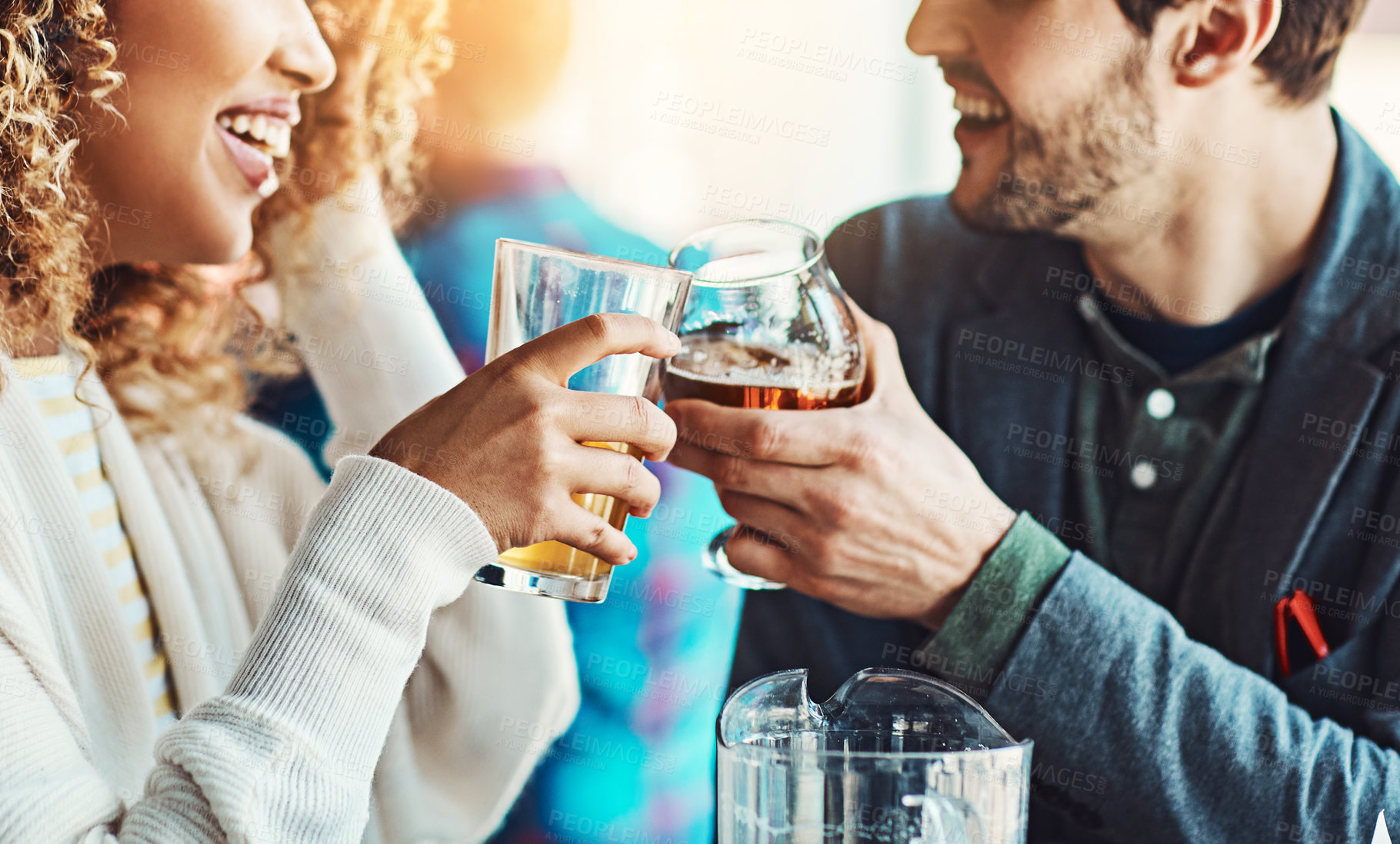 Buy stock photo Couple, people and happy with beer in pub on date with support, joy and fun. Relationship, glass and smile in love for celebrating with bonding, drinking alcohol and together in bar for fun and relax