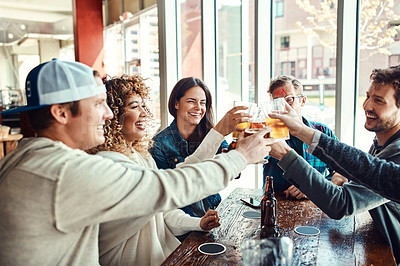 Buy stock photo Cheers, beer and friends at restaurant in celebration of birthday event in urban New York bar. Group of people with smile for happiness and gathering together with alcohol beverage at summer lunch