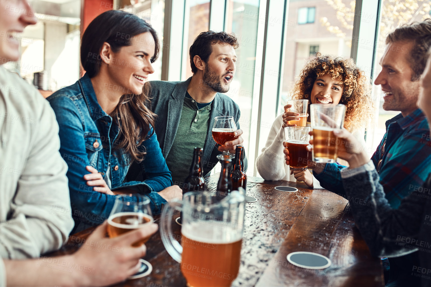 Buy stock photo Friends, people and smile in pub for beer with laugh for reunion, social gathering and date. Bar, relationship and happy with glass for drinking alcohol for fun, bonding and together with support