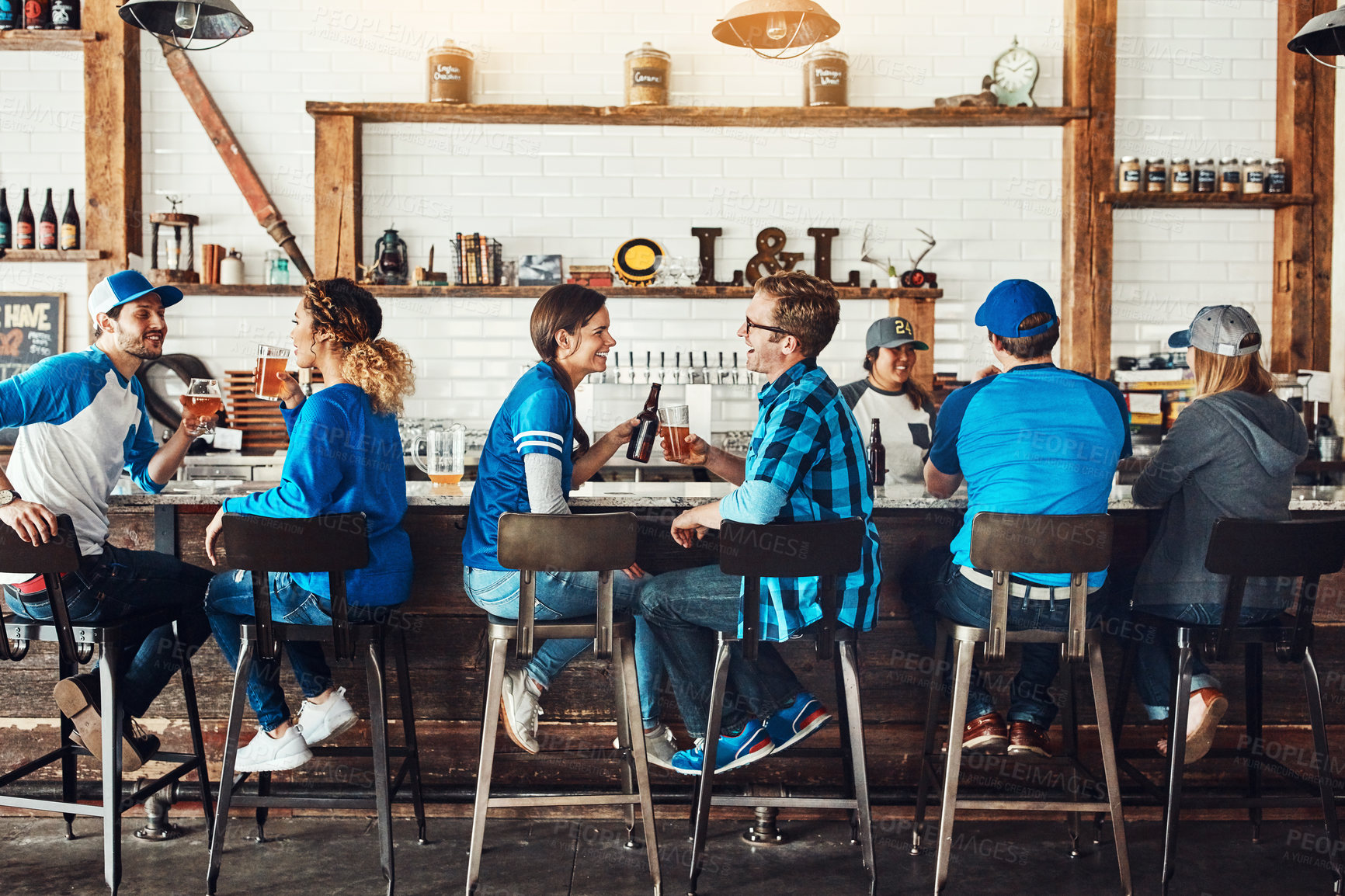 Buy stock photo Sports, toast or happy people in pub with beer, popcorn or social celebration of competition together. Crowd, soccer game or group of friends in bar for party, alcohol or fans at diner for culture