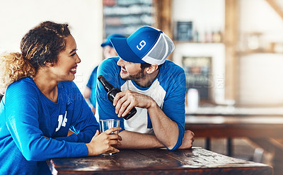 Buy stock photo Sports, love or couple in pub with alcohol, smile or social celebration of competition together. Relax, soccer game or fun people in bar for watch party, beer drinks or fans at diner for happy hour