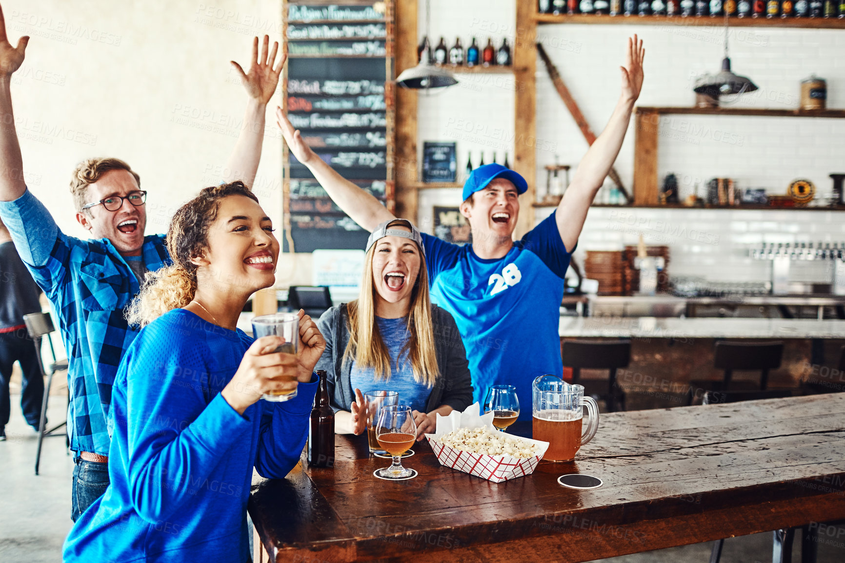 Buy stock photo Sports, excited and people in pub with celebration, tv and fans with beer at world cup broadcast. Solidarity, games and group of happy friends in bar for baseball watch party, drinks and team support